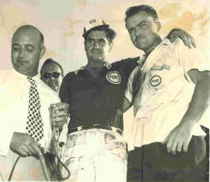 Buck Baker in the middle with Pure shirt