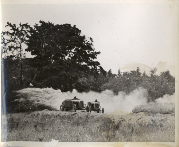 Lloyd (left)and Bill Rexford (right) going through turn 3 + 4 at Penny Royal Race Track, Leon N.Y. in a jalopy race, 1947.
